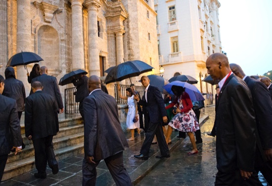 President Barack Obama (center) and first lady Michelle Obama, visit la Catedral de La Habana in Havana on Sunday. Obama’s trip is a crowning moment in his and Cuban President Raul Castro’s ambitious effort to restore normal relations between their countries