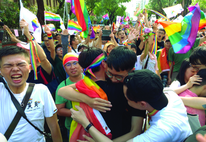 Macau Daily Times Gay Couples Plan Mass Weddings After Taiwan Legalizes Unions Macau